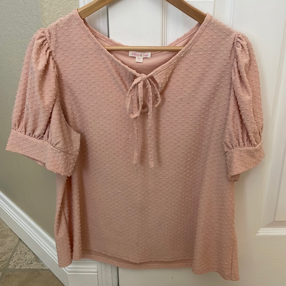 Pink top with bow